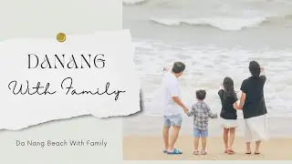 Happy Family of Four at Da Nang Beach Parents Daughter and Little Son