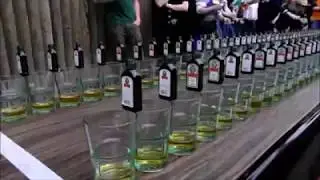 Amazing World Record 1000's of wine bottles into the glass