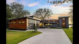 Architectural Waterfront Estate with Deep Water Dock and Wellness Space