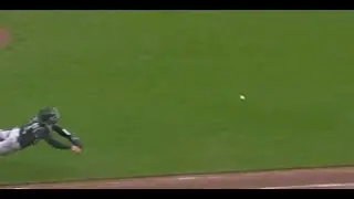 Tony Wolters charges makes diving underhand throw