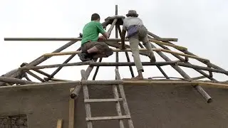 Helping to build a roof on a Xhosa house Vlog 7