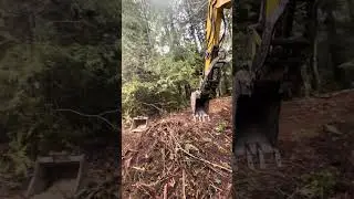 Operator POV - Cat 308E Excavator final clean up on access road
