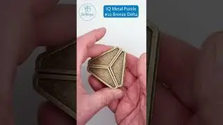 IQ Metal Puzzle Teaser Bronze Delta Design 22. No solution shown - spoiler-free.