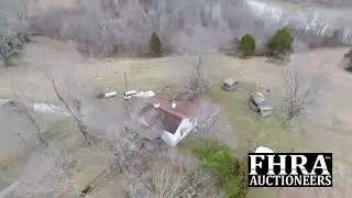 Freeman Auction features 20 acres and a farm home on a lake for sale in KY at auction by FHRA Inc.