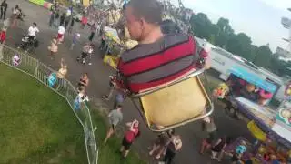 Fair swing ride in a storm!