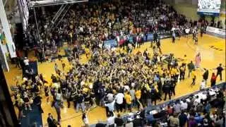 Students Rush Court at Tom Gola Arena