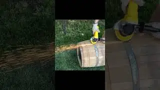 Cutting open s barrel for a whiskey bottle display.
