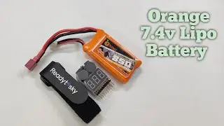Orange 7.4V Lipo Battery and it's accessories