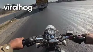 Biker Almost Crashed While Riding Beside a Truck || ViralHog