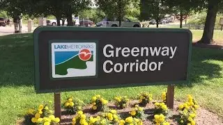 Police respond after a woman shot at Lake MetroParks on bike trail in Lake County
