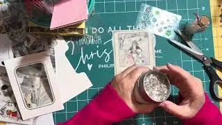 Snowy winter embellishments one is a shaker made from packaging using bling(glitter and sequins)