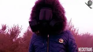 Warm navy ski suit. Trying on different gas masks. Gas mask tests - walking in a gas mask.