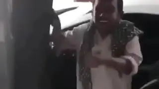 indian dude closing car door on his fingers