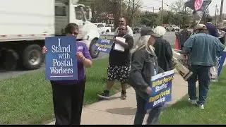 Postal workers rally for better conditions