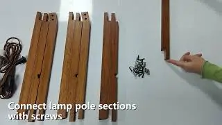 Installation of wooden floor lamp with shelf