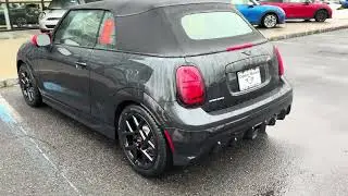 Round about view of a 2026 legend gray Mini Cooper JCW John Cooper Works Convertible in the rain 