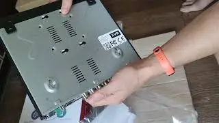 Распаковка  Видеорегистратор CoVi Security XVR-4500-4K из Rozetka