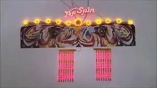 Fa&ccedil;ade Top Spin Faller illumin&eacute;e par Fantaisyland