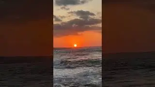 Enchanting sunset in Crete, orange sun