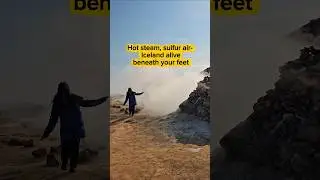 Walking past steaming fumaroles at Hverir, North Iceland