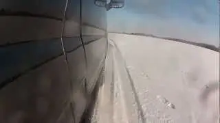 Lionel Firn Drifting a Van in the Snow