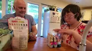 Genev'e with Dad . Opening Easter candy