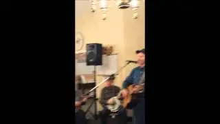 Jack sings Folsom Prison Blues accompanied by Mark Ludwick