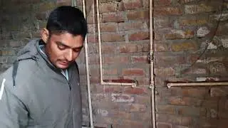 The attached bathroom includes two English-style toilets, an Indian-style toilet, a washbasin,
