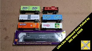HO Scale IHC Alco C628 Diesel Locomotive Pulling Life-Like Billboard Advertising 40 Foot Box Cars