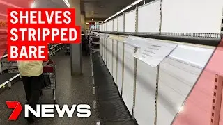 Shelves stripped bare: panic buying continues to empty stores | 7NEWS