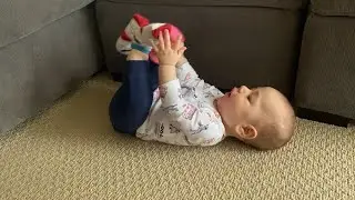 The Importance of Baby Reaching Hands to Feet | A Parenting Guide