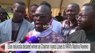 Nalukoola bamulangiridde mubunkenke obwawagulu. Olumazze nebamuddusa