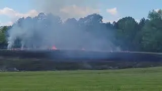 Burning the field.