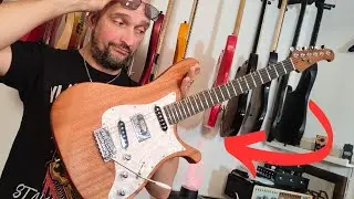 Une guitare de luthier ORIGINALE et BIEN FOUTUE !