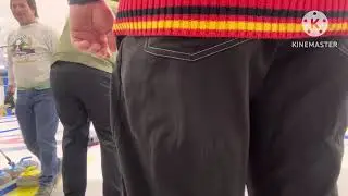 Playing curling