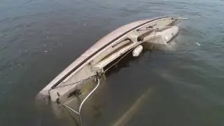 Humberston beach, aerial drone view of a sunken yacht looking very sad