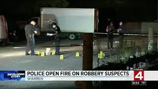 Police open fire on robbery suspects