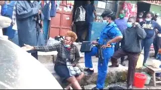 DRAMA IN NAKURU AS A WOMAN THREATENS TO TRIP NAKED TO RESIST ARREST DURING A MITUMBA PROTEST!