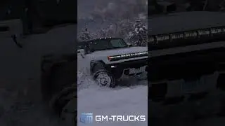 Hummer EV playing in the snow