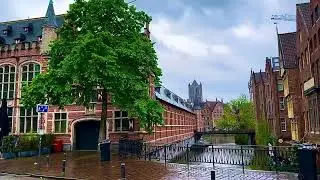 Gravesteen castle moats from Leie river next to it in medieval town of Ghent, Belgium