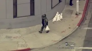 Robbers Strap 'Bomb' to Bank Manager