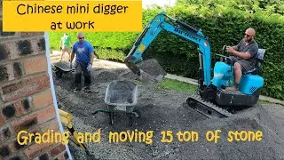 The Chinese mini digger at work again... grading and loading stone [and some problems]