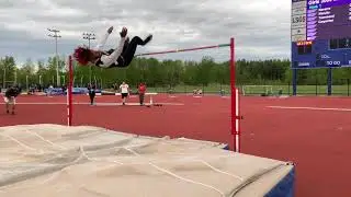 Henninger High School high jumper Kwamere White clears 6' 9