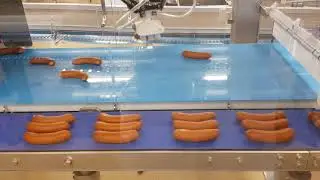 Robotcelle for p&oslash;lsepakking levert av Dynatec