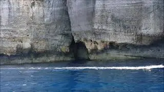 Boat ride through the tunnels of Azure window in Gozo/Malta.