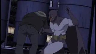 Darkwing captures thug on a rooftop&mdash;Invincible.