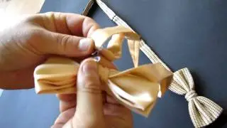 Hur man ställer in och sätter på sig en knuten fluga