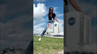 Giant Teresa takes on the giant Vehicle Assembly Building at Kennedy Space Center