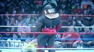 Armed Johnson gets smashed with a Guitar by Jeff Jarrett.