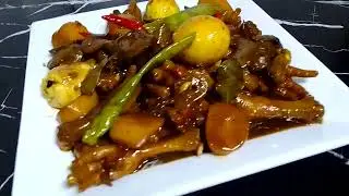 Spicy Adobong chicken feet mix chicken liver boiled egg and potato....